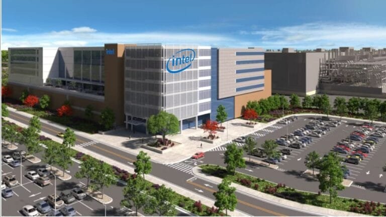 Construction site of Intel’s $28 billion Ohio semiconductor factory, showing large-scale equipment and unfinished buildings.