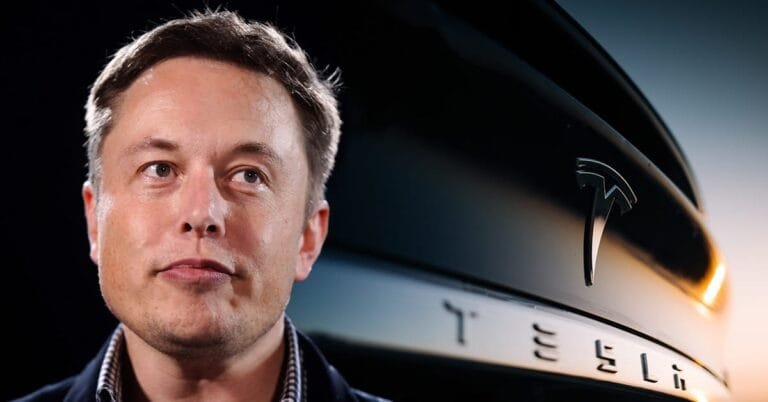 Elon Musk speaking about the Tesla Musk compensation package at a company event