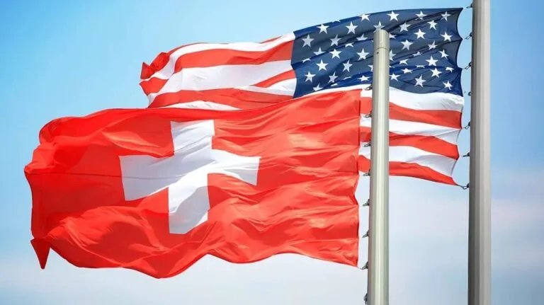 US-Switzerland trade partnership handshake